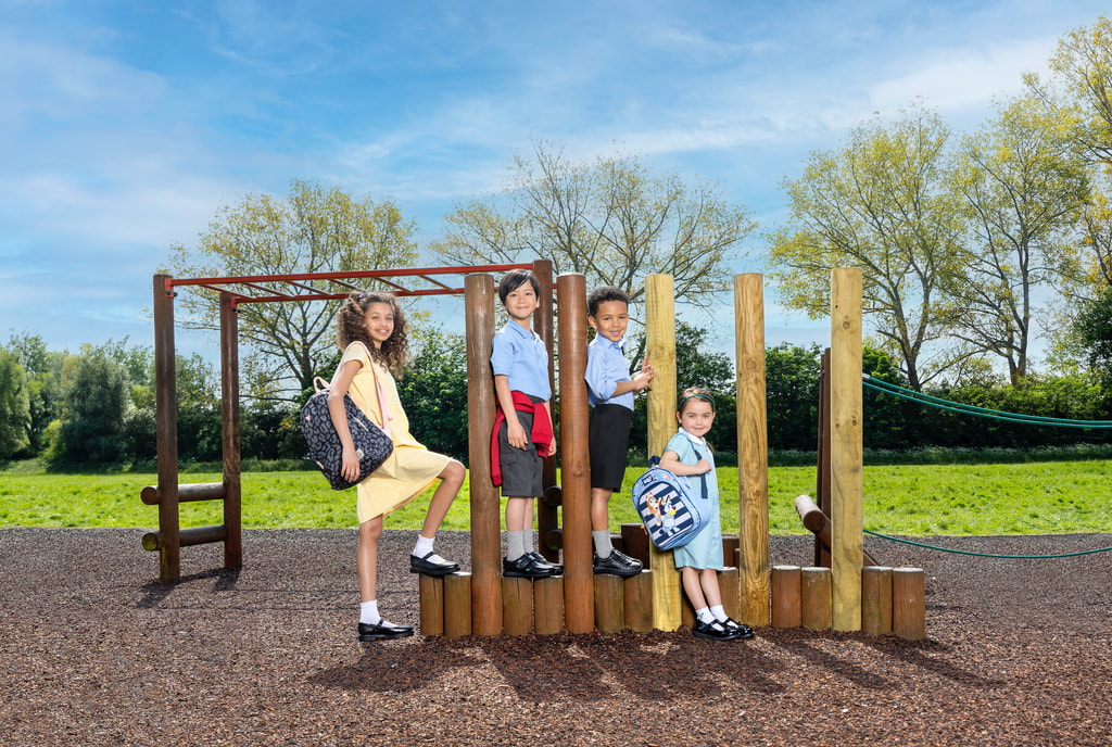 children in school uniform in playground