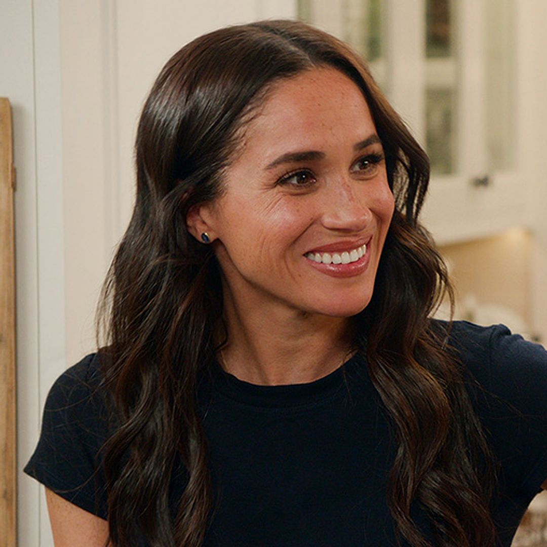 Red-haired Archie and Lilibet are Meghan's little helpers in precious new photos