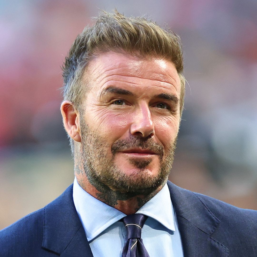 David Beckham debuts hair transformation on solo trip