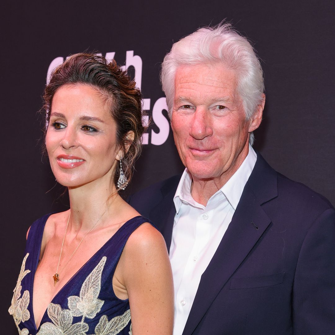 Richard Gere's strapping son eclipses 5'10" dad and stepmom on the red carpet